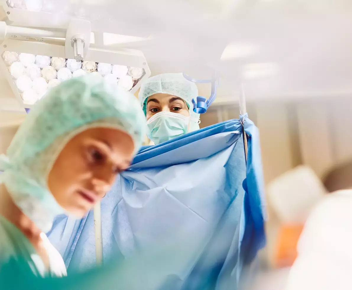 Doctors in a surgery room. 
